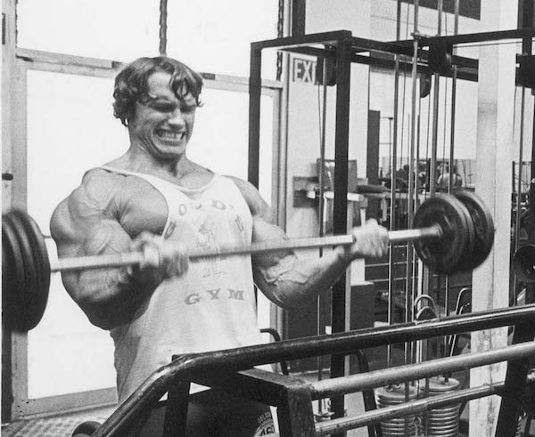 Arnold working the biceps